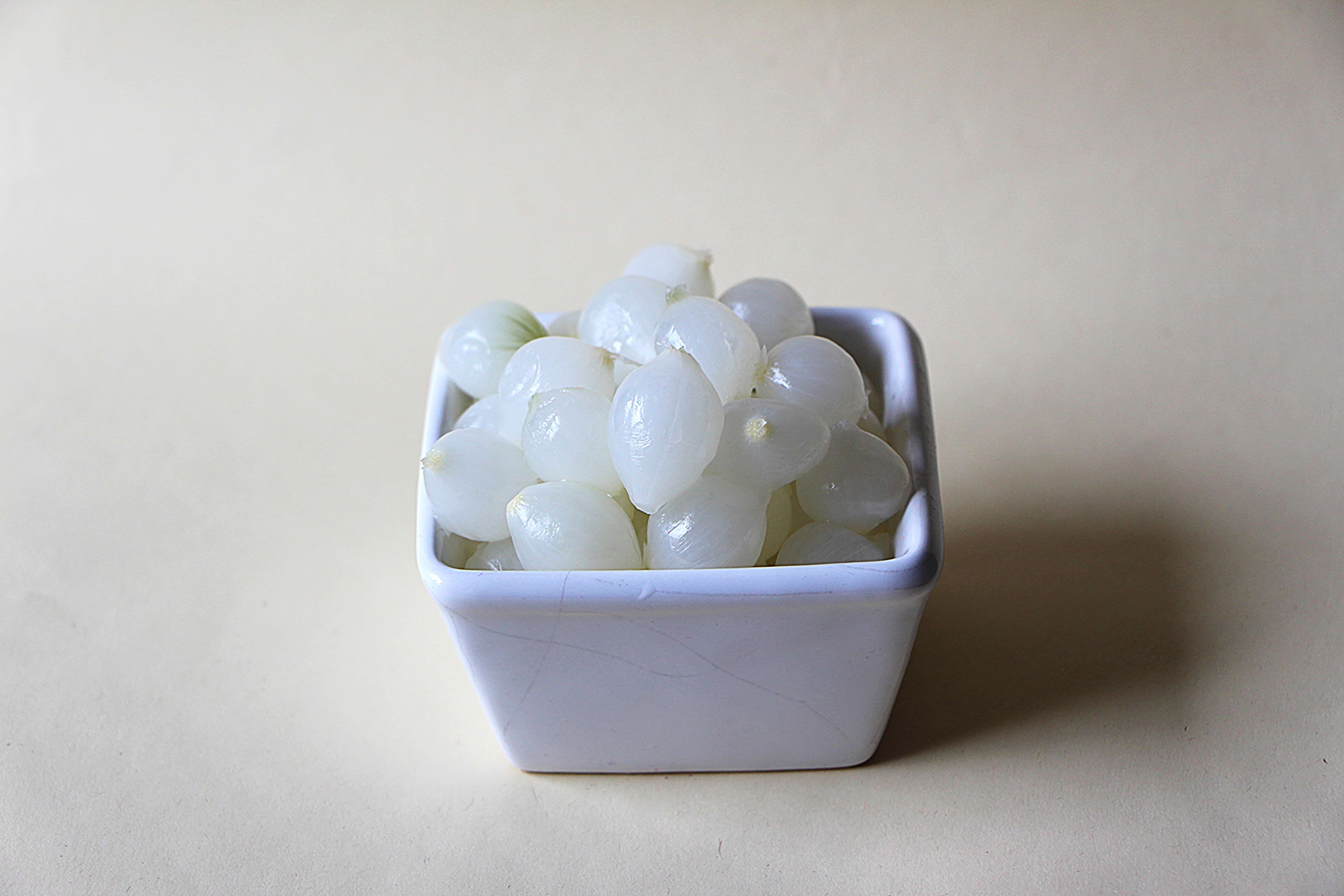 Cebolletas tiernas con aliño suave de anchoa aperitivo delicado